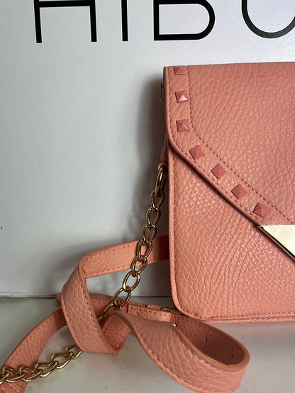 WHITE. Pink studded bag