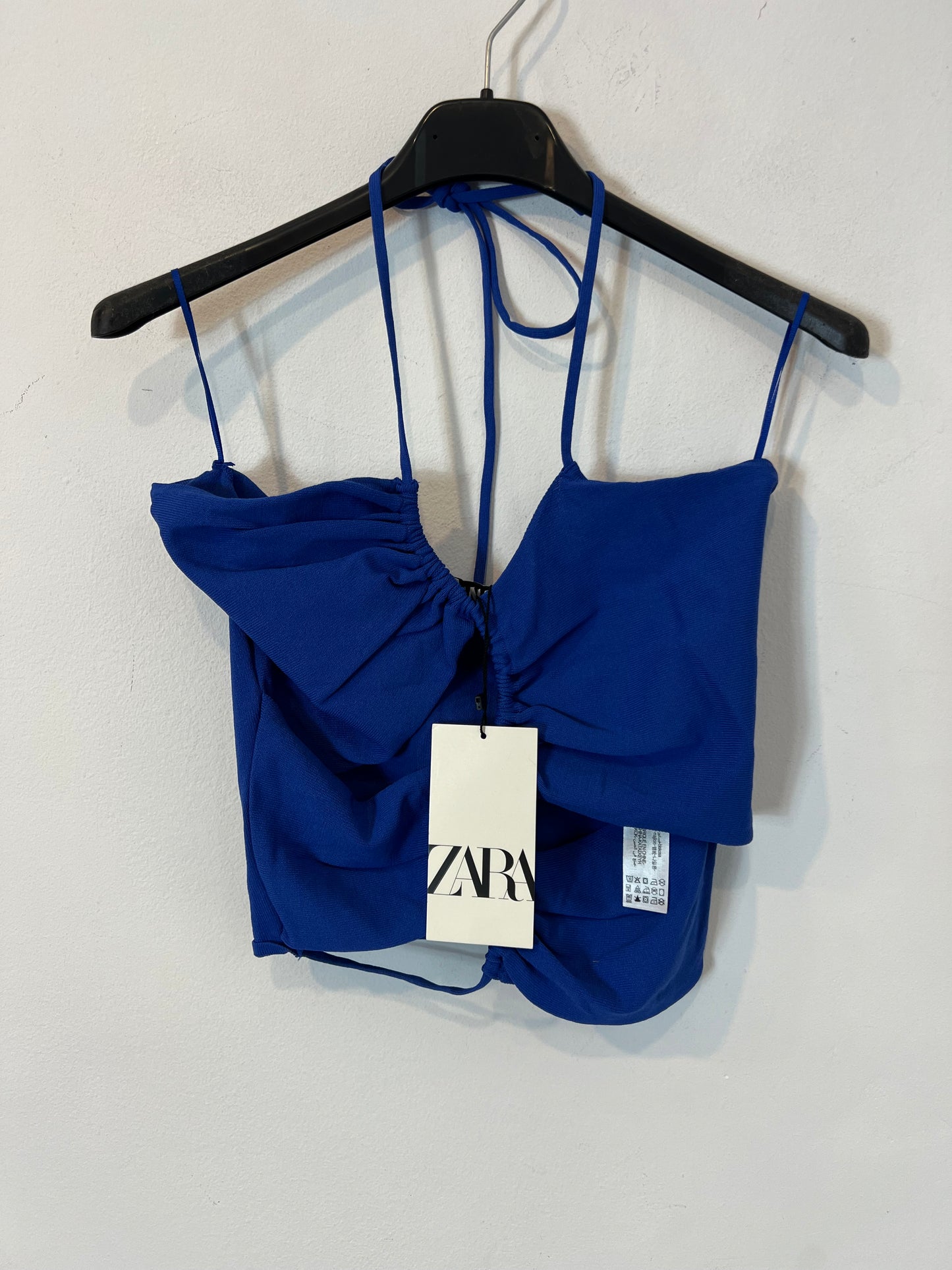 ZARA. Elastic blue top with openings. TM