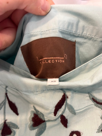 IQ. Falda midi azul claro bordada. T XS (tara)