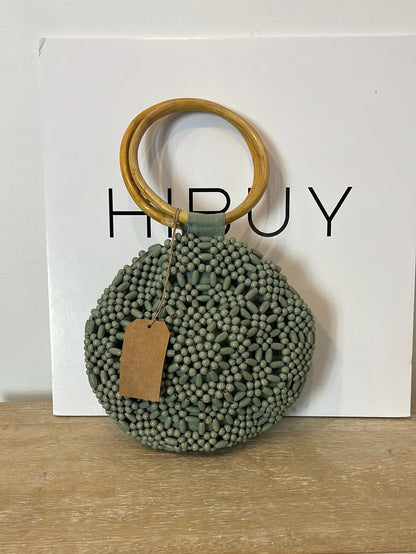 SALVADOR BACHILLER. Bolso redondo detalle asa