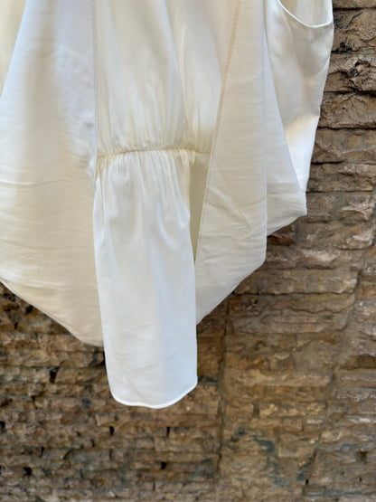 COAST WEBER AHAUS. Top color crudo detalle cuello