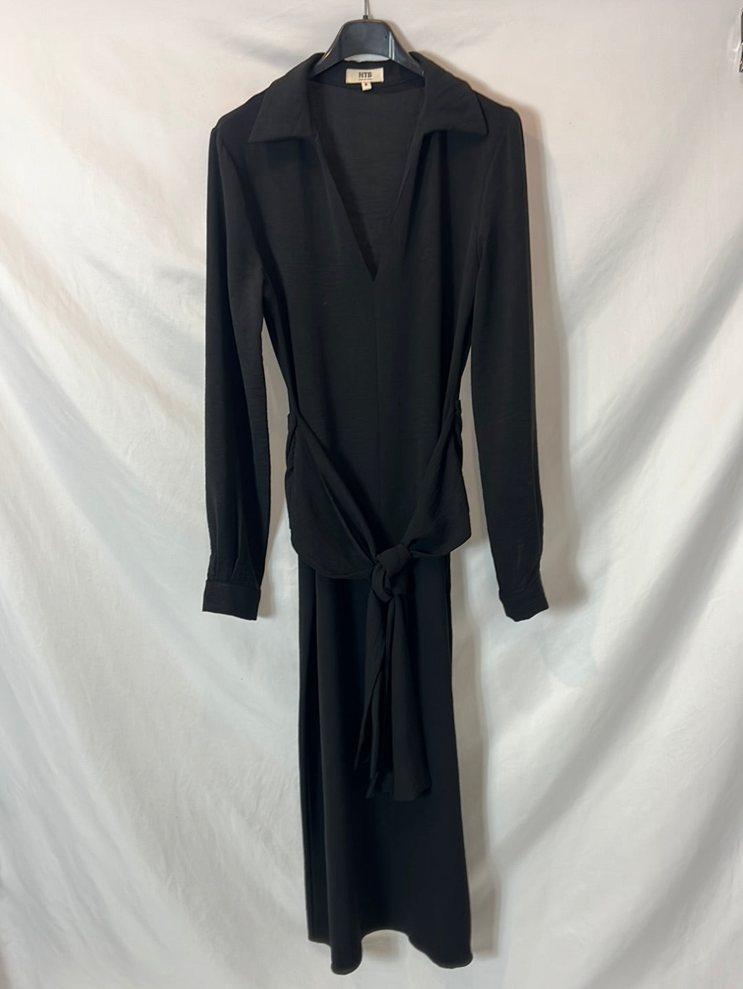NAME THE BRAND. Black Ts bow dress