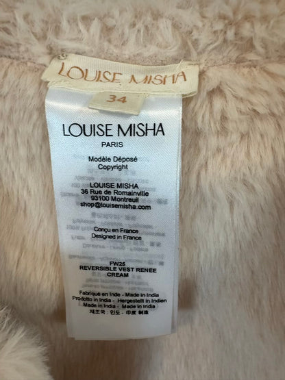 LOUISE MISHA. Chaleco beige bordados pelito