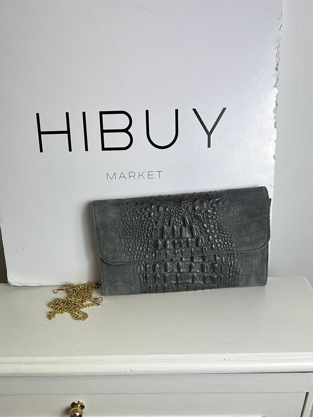 OTRAS. Bolso/cartera piel gris troquelada