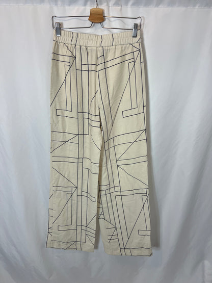 ZARA. Pantalón fluido beige estampado geométrico . T S