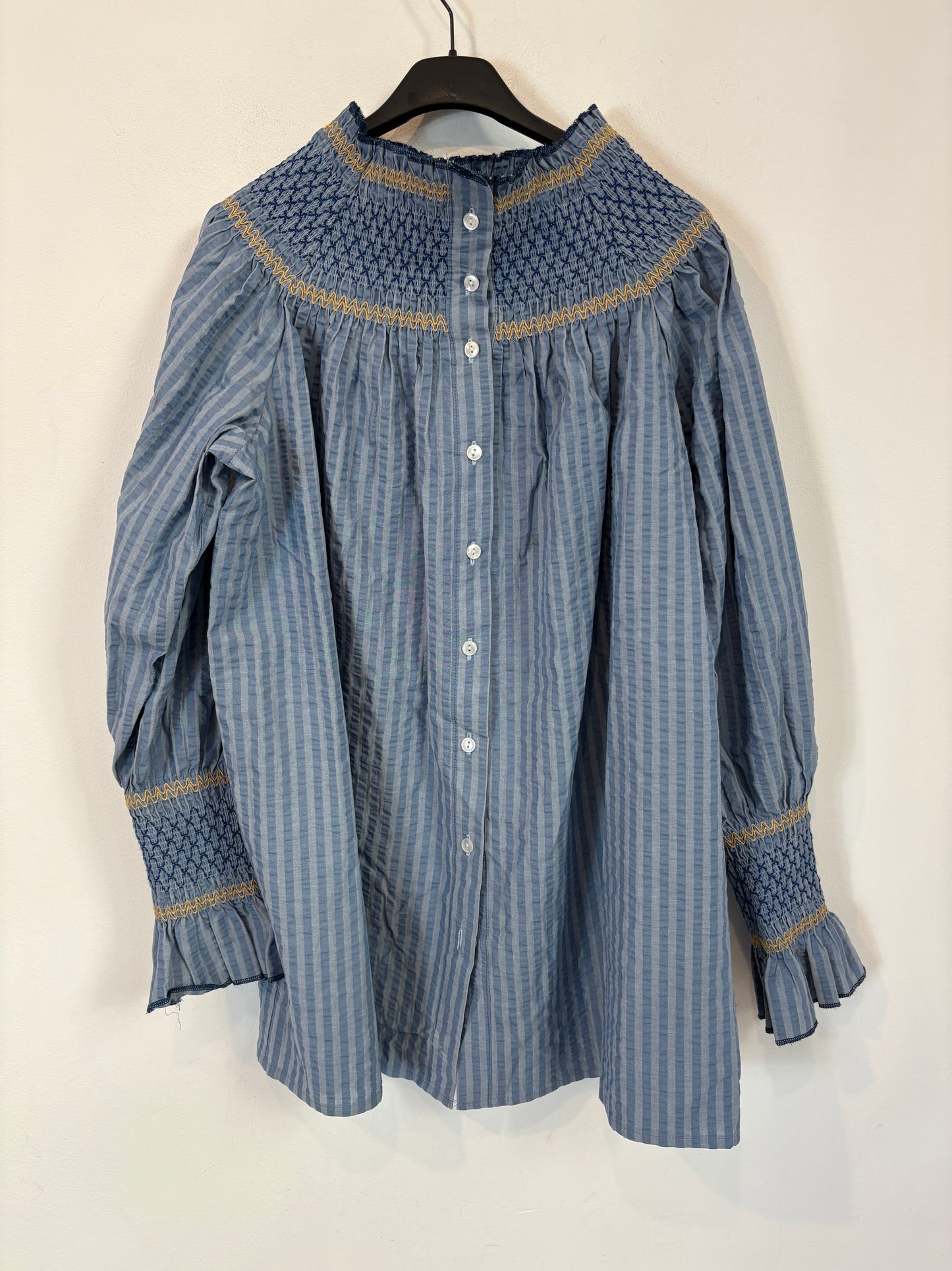 OTHERS. Blue blouse with honeycomb detail. TS