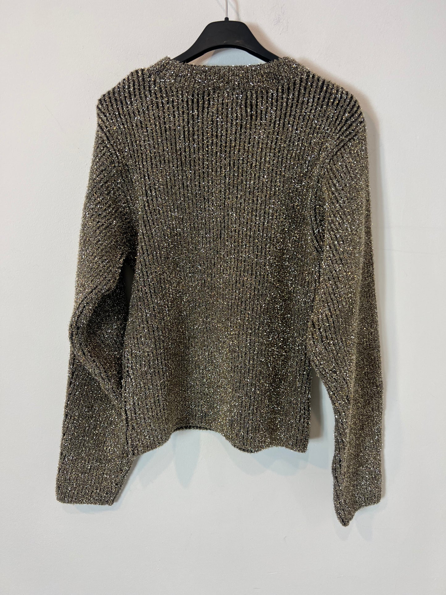 H&M. Jersey textura hilos brillo. T M