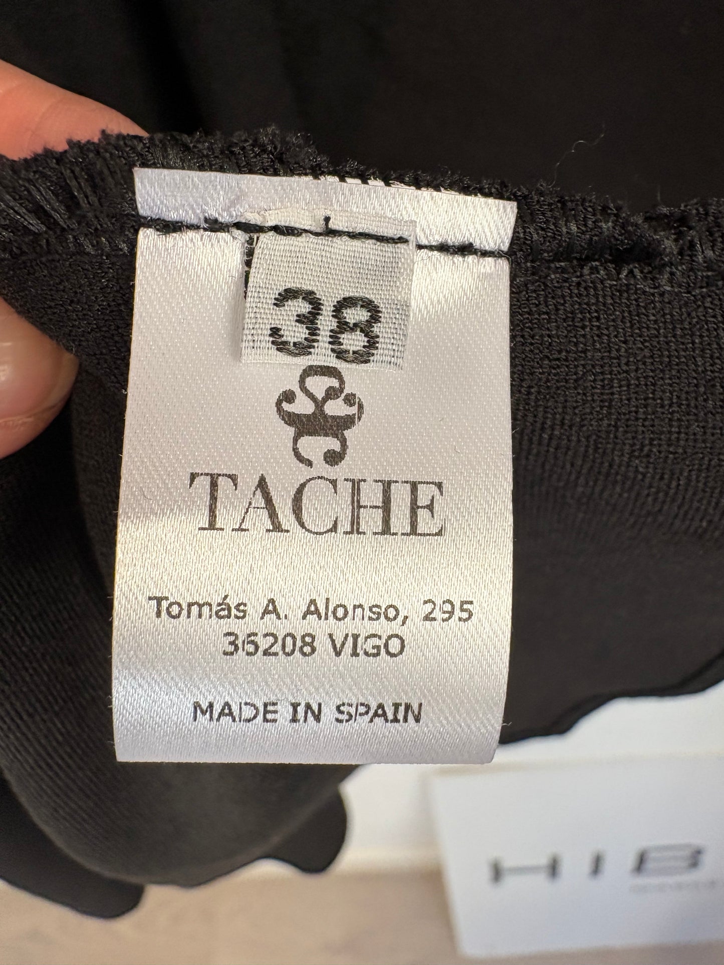 TACHE . Falda midi fluida cruzada. T 38