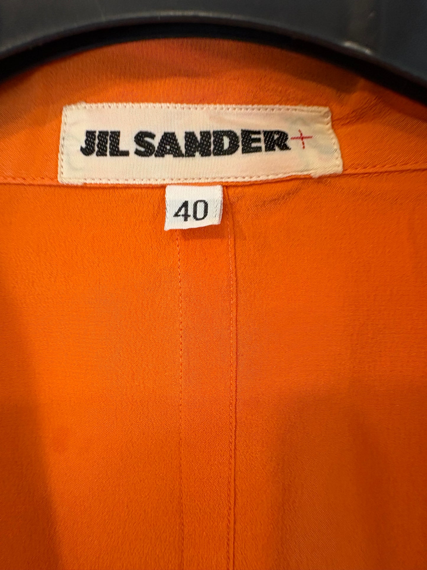 JIL SANDER. Blusa cruzada seda