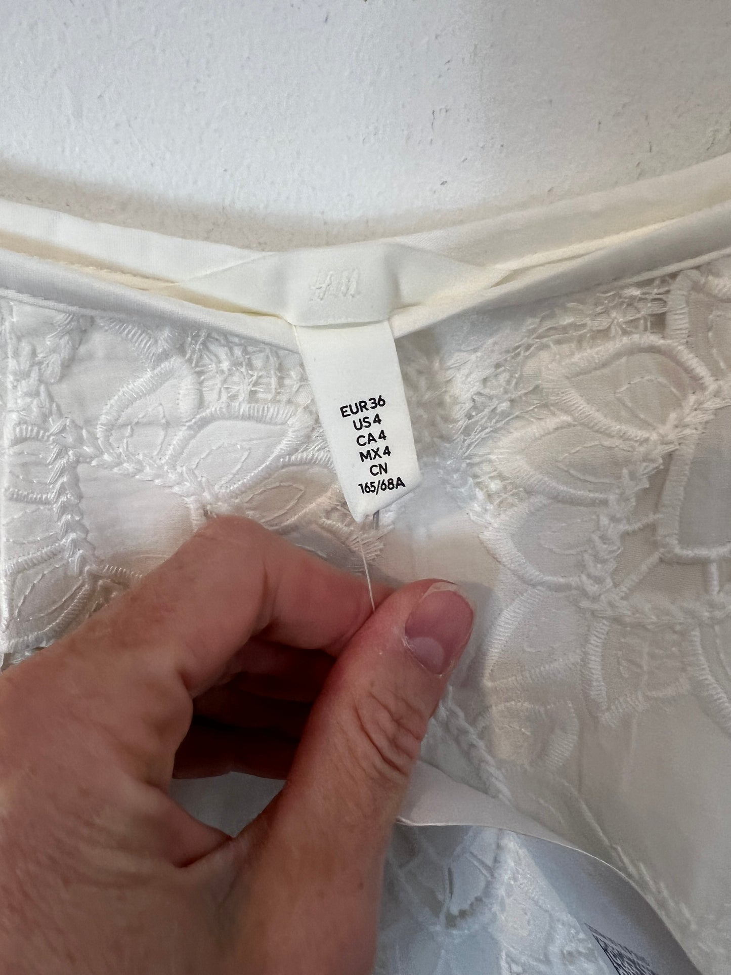 H&M. Falda blanca larga de encaje