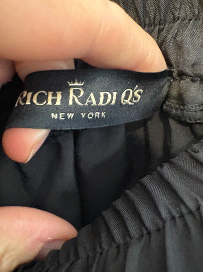 RICH RADI Q´S. Falda midi encaje volantes