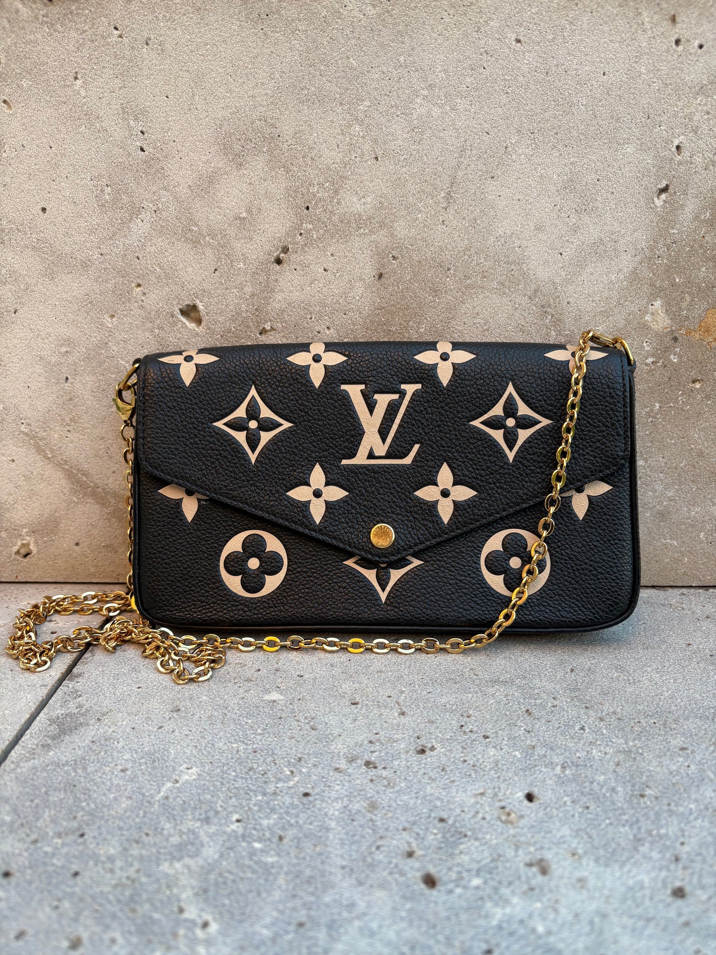 LOUIS VUITTON. Cartera de mano Félicie