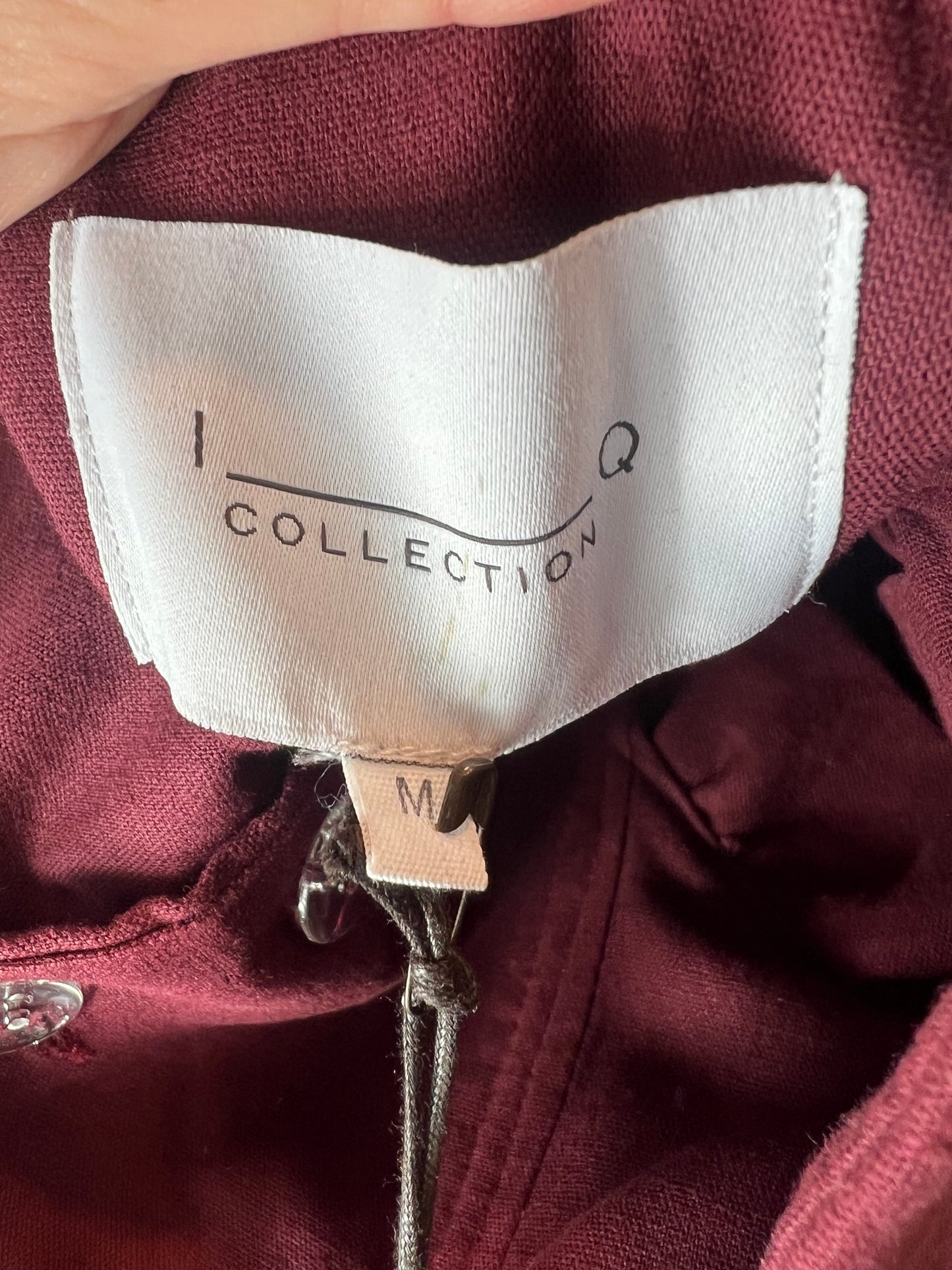 IQ.  COLLECTION. Falda larga burdeos. T M (tara)