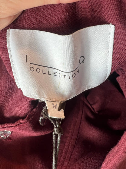 IQ.  COLLECTION. Falda larga burdeos. T M (tara)