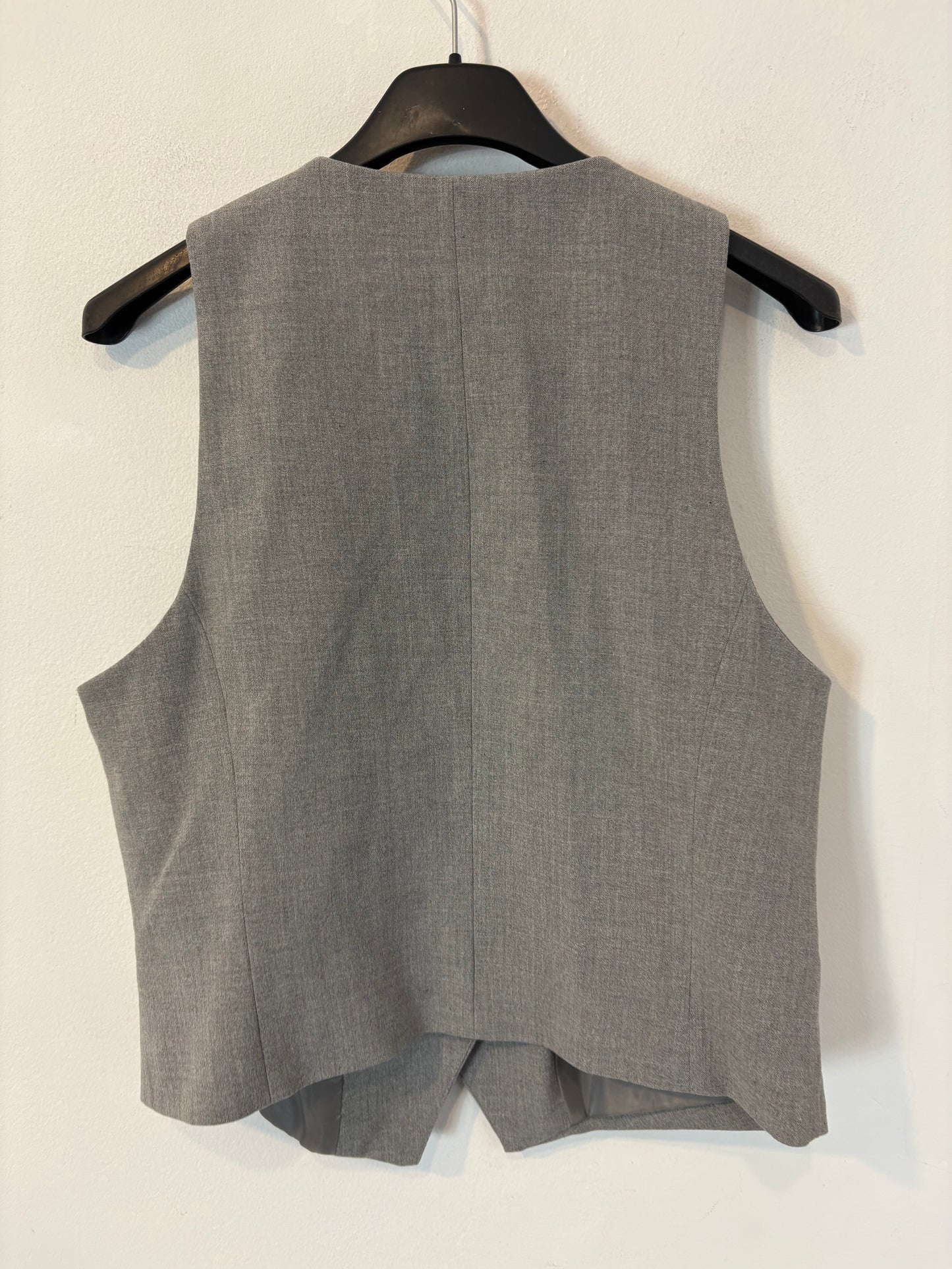 ZARA. Chaleco gris claro