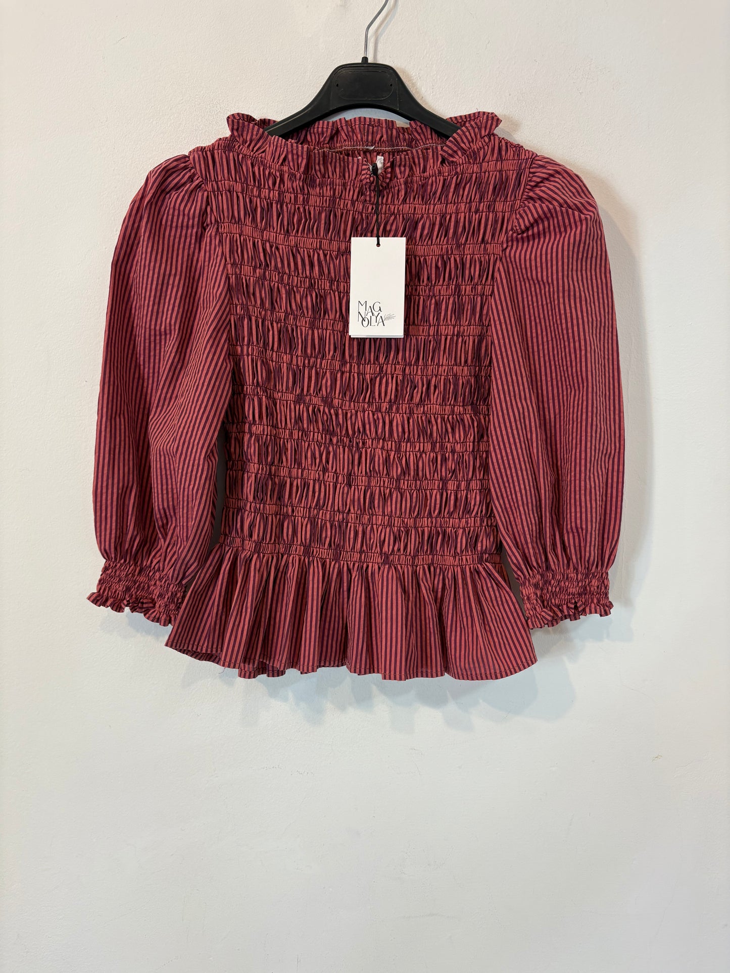 MAGNOLYA. Blusa rosa nido de abeja