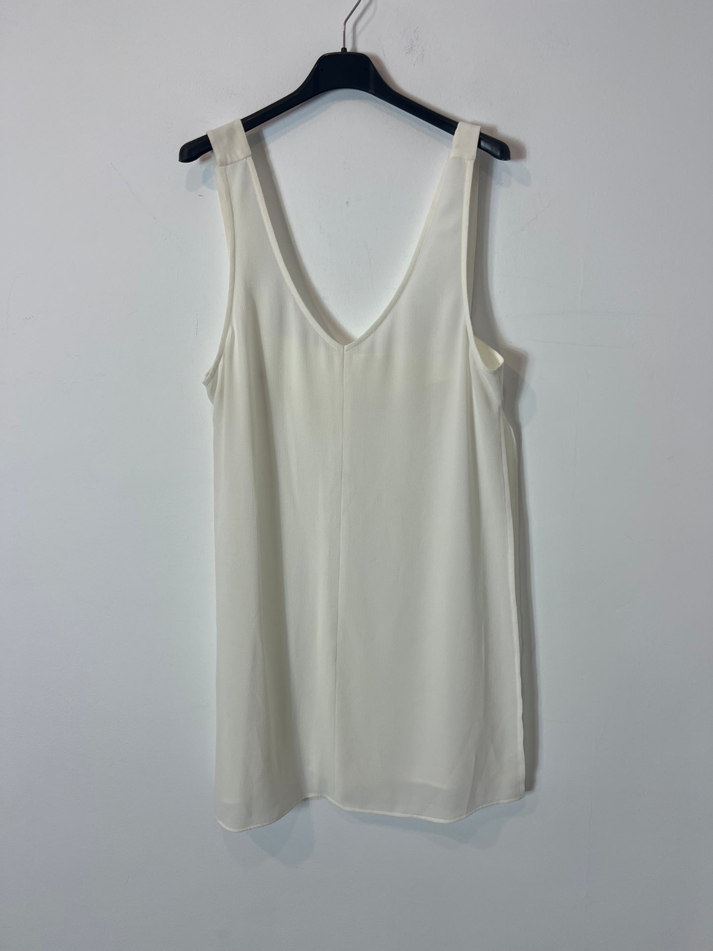 OTRAS. Top blanco fluido aberturas. T M/L