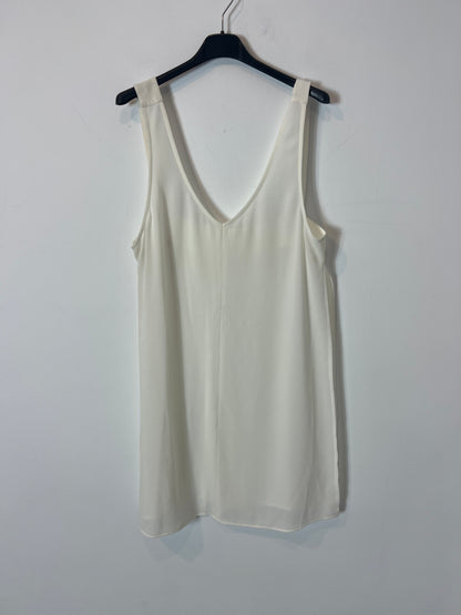 OTRAS. Top blanco fluido aberturas. T M/L