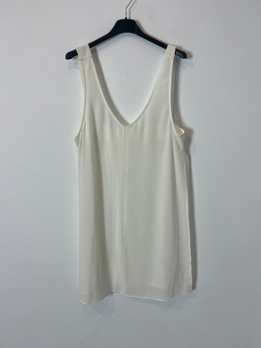 OTRAS. Top blanco fluido aberturas. T M/L