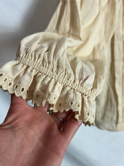 TINTORETTO. Blusa beige volante T.s