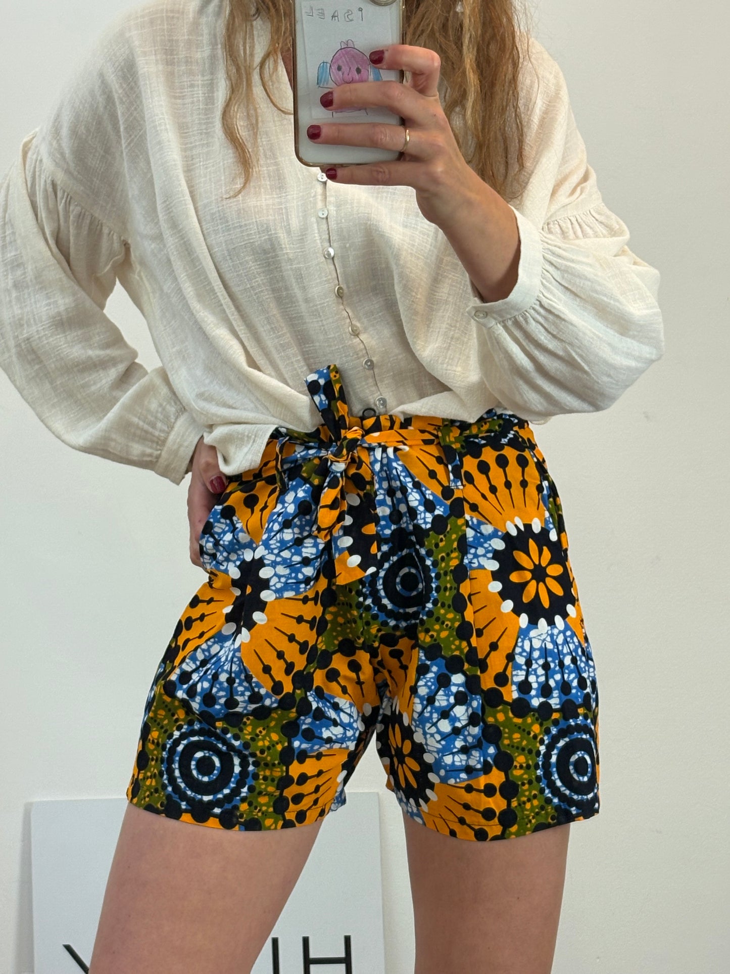 Bermudas estampado africano