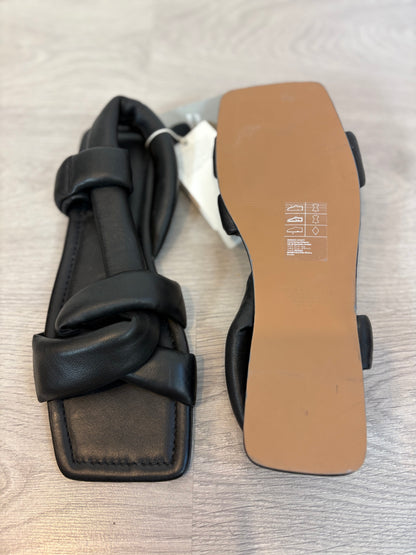 H&M. Sandalia piel cruzadas en negro. T 40