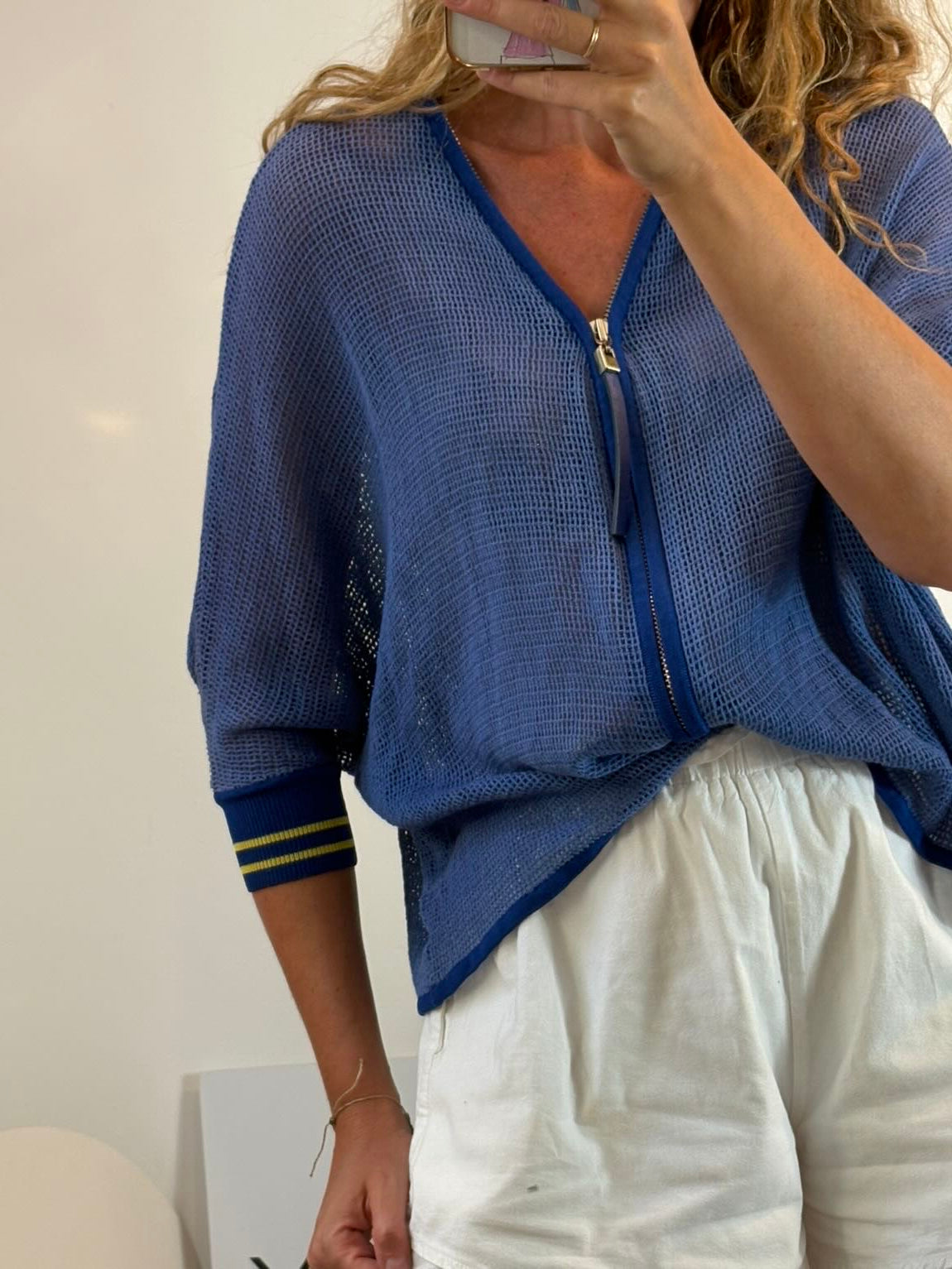HOTEL PARTICULIER. Chaqueta azul calada