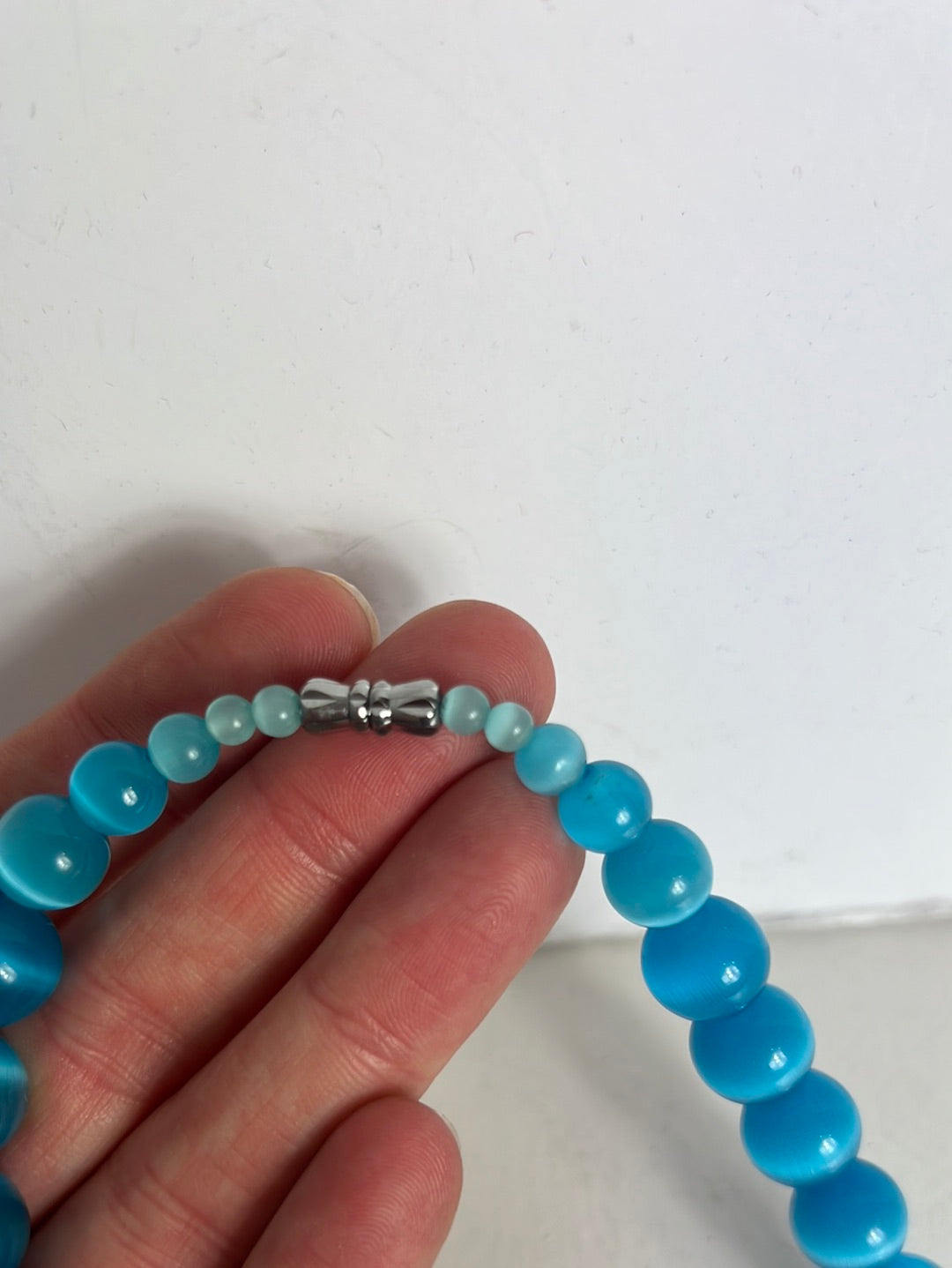 OTHERS. Blue boots necklace