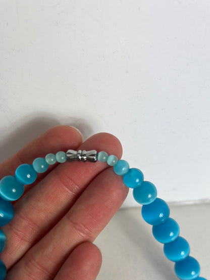 OTHERS. Blue boots necklace