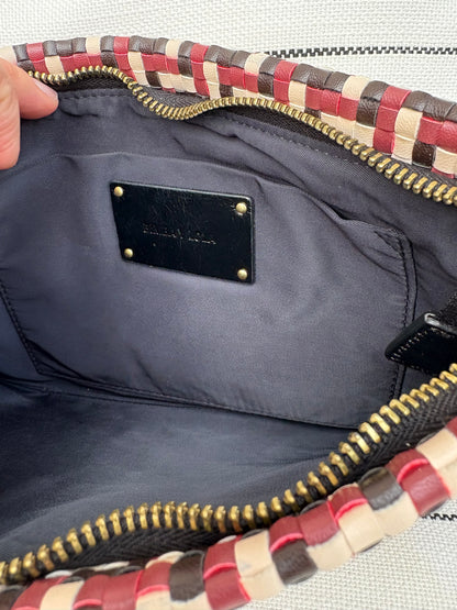 BIMBA Y LOLA. Cartera de mano trenzada