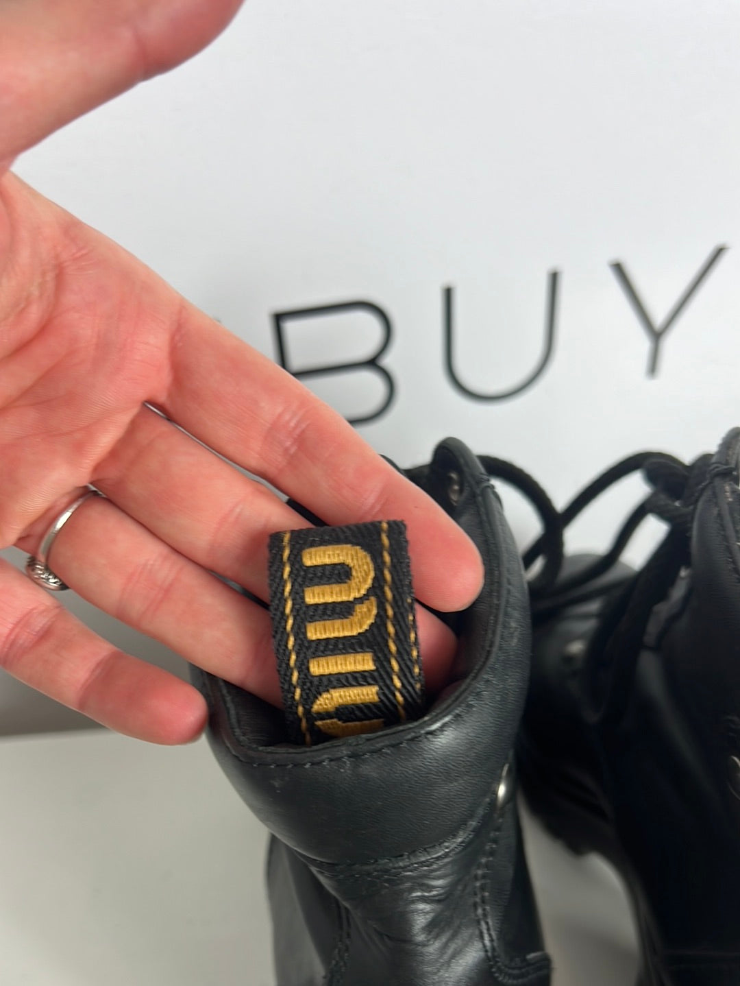 MIU MIU. Black lace-up heeled ankle boots. Size 39