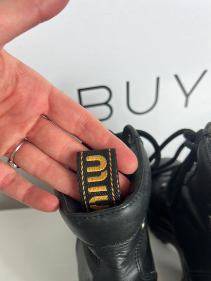 MIU MIU. Black lace-up heeled ankle boots. Size 39