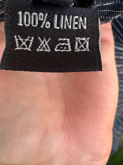 CORTANA. Falda midi abotonada lino. T 38