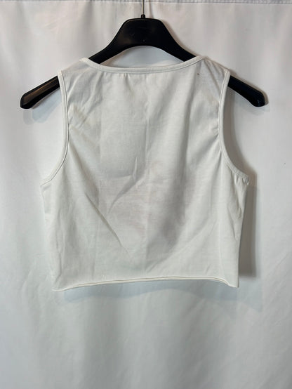 OTHERS. White crop top with red letters. S XS/S