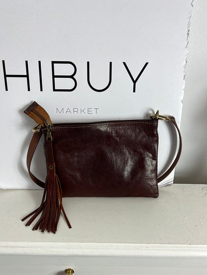 OTHERS. Brown leather bag with studs