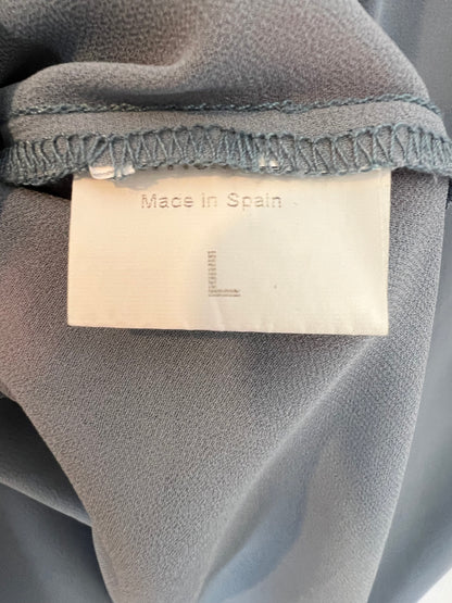 BIMANI. Blusa larga aberturas semitransparente. T L