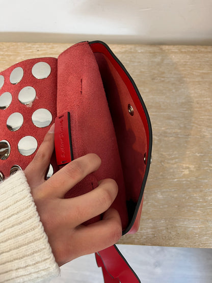 &OTHER STORIES. Riñonera tachuelas