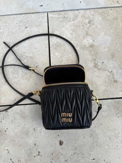 MIU MIU. Matelassé nappa leather micro bag