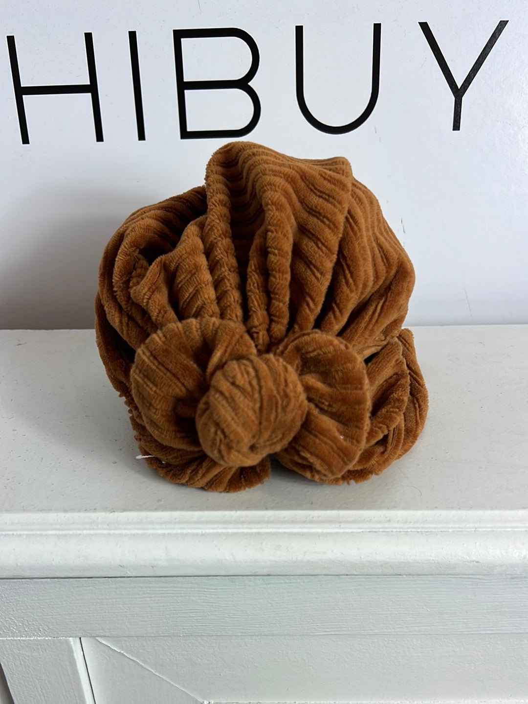 OTHERS. Brown turban-style hat. Size 1-3 years