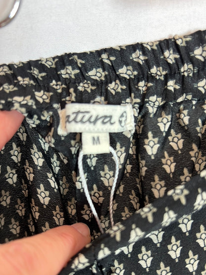 NATURE. Total look black fluid print. TSM