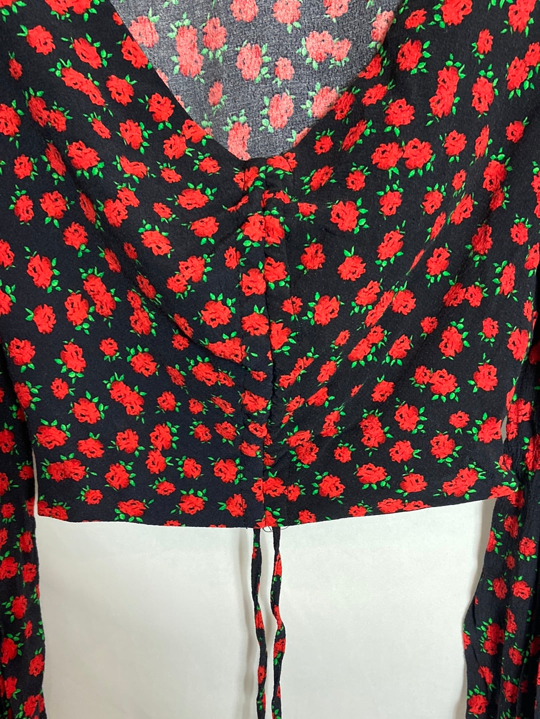 BERSHKA. Black floral print top