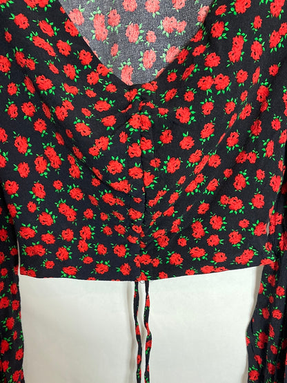 BERSHKA. Black floral print top