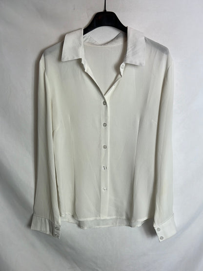 OTRAS. Blusa blanca fluida . T M
