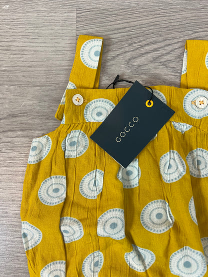 GOCCO. Ranita amarilla círculos T.6-9 meses