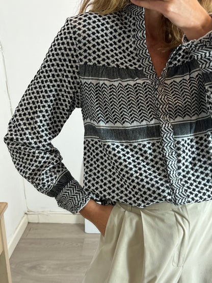 ROUGH STUDIOS.Ts printed black shirt