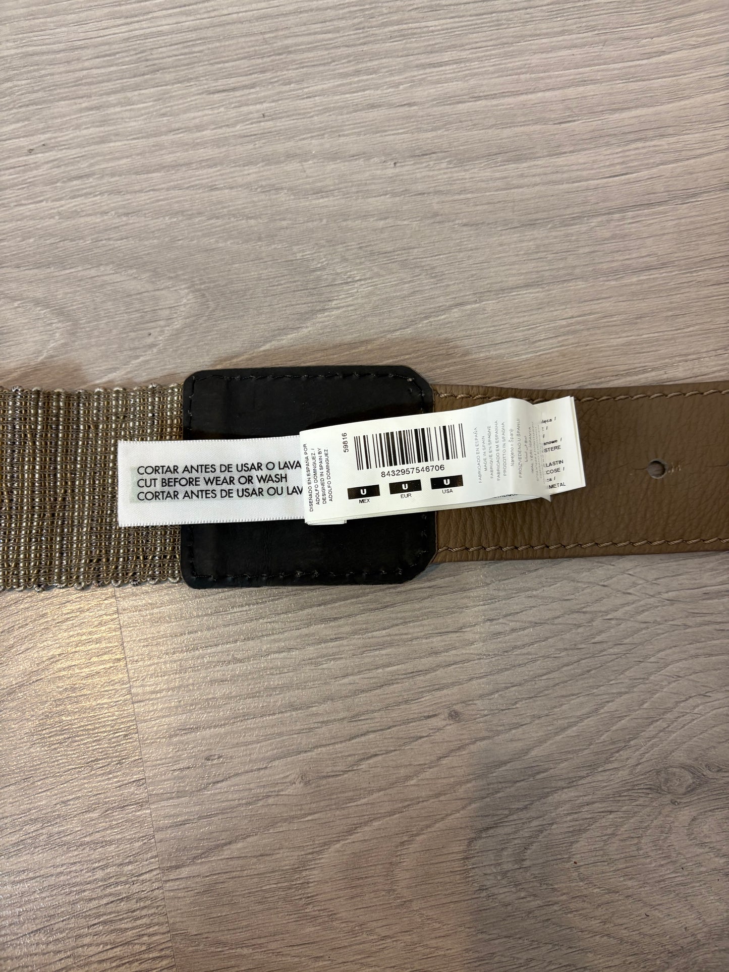 ADOLFO DOMINGUEZ. Cinturón semi elástico con piel