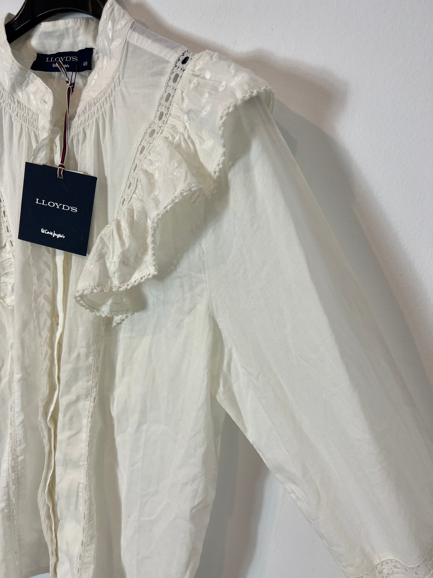 LLOYD'S. White ruffled blouse, size 40