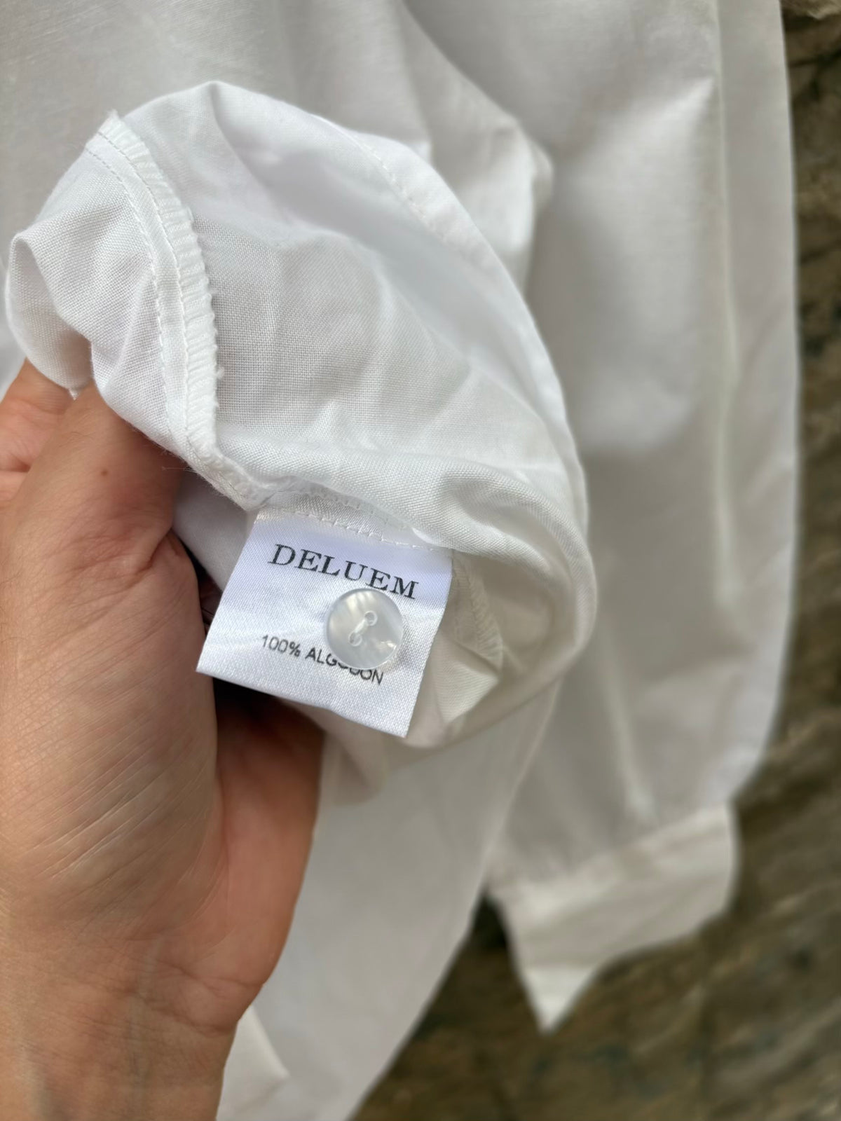 DELUEM. Camisa blanca detalle cuello