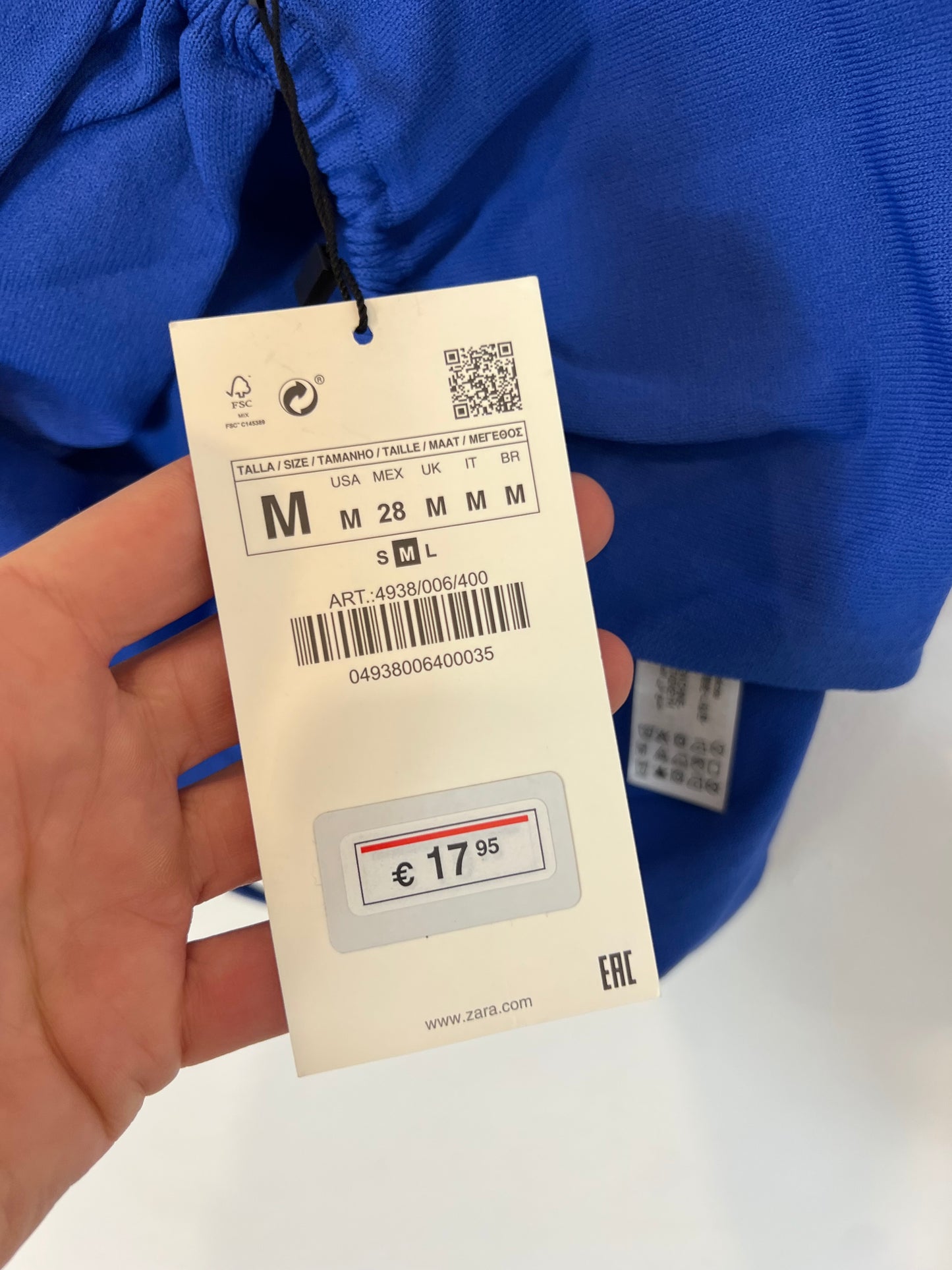 ZARA. Elastic blue top with openings. TM