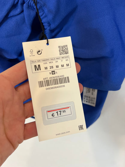 ZARA. Elastic blue top with openings. TM